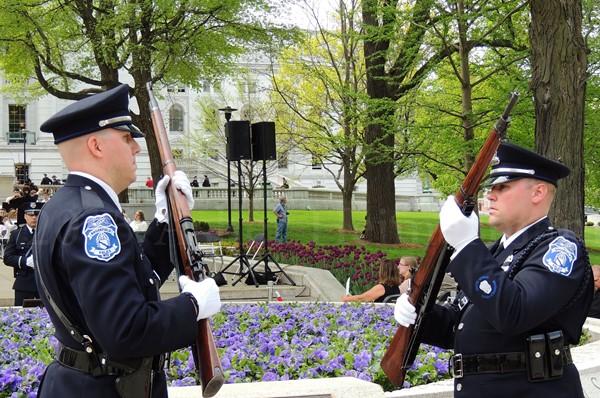 Police Officers Positioned Before Memorial WLEM 2015